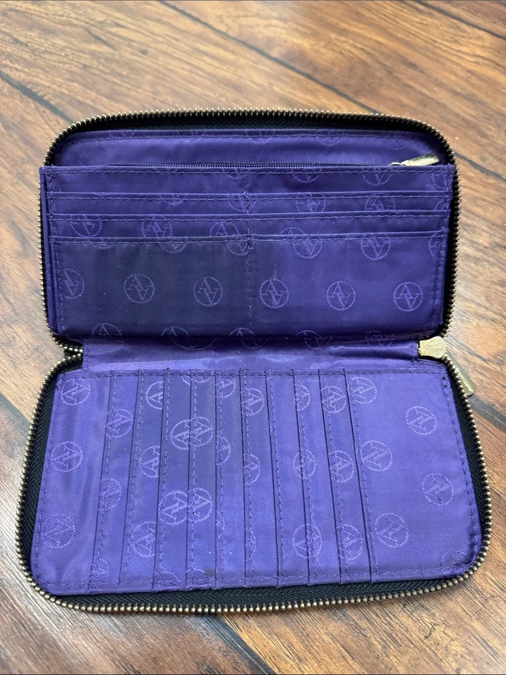 Adrienne Vittadini Black Zip Around Wallet Purple Interior Pebbled